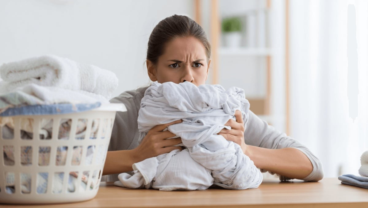 The Quick And Easy Hack That Keeps Sheets From Balling Up In The Dryer