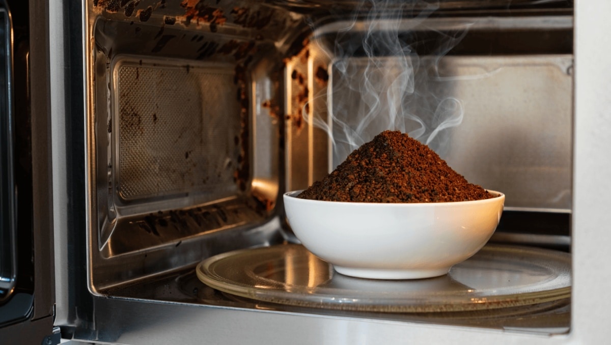 The Little-Known Coffee Grounds Trick That Removes Burnt Smells From Your Microwave