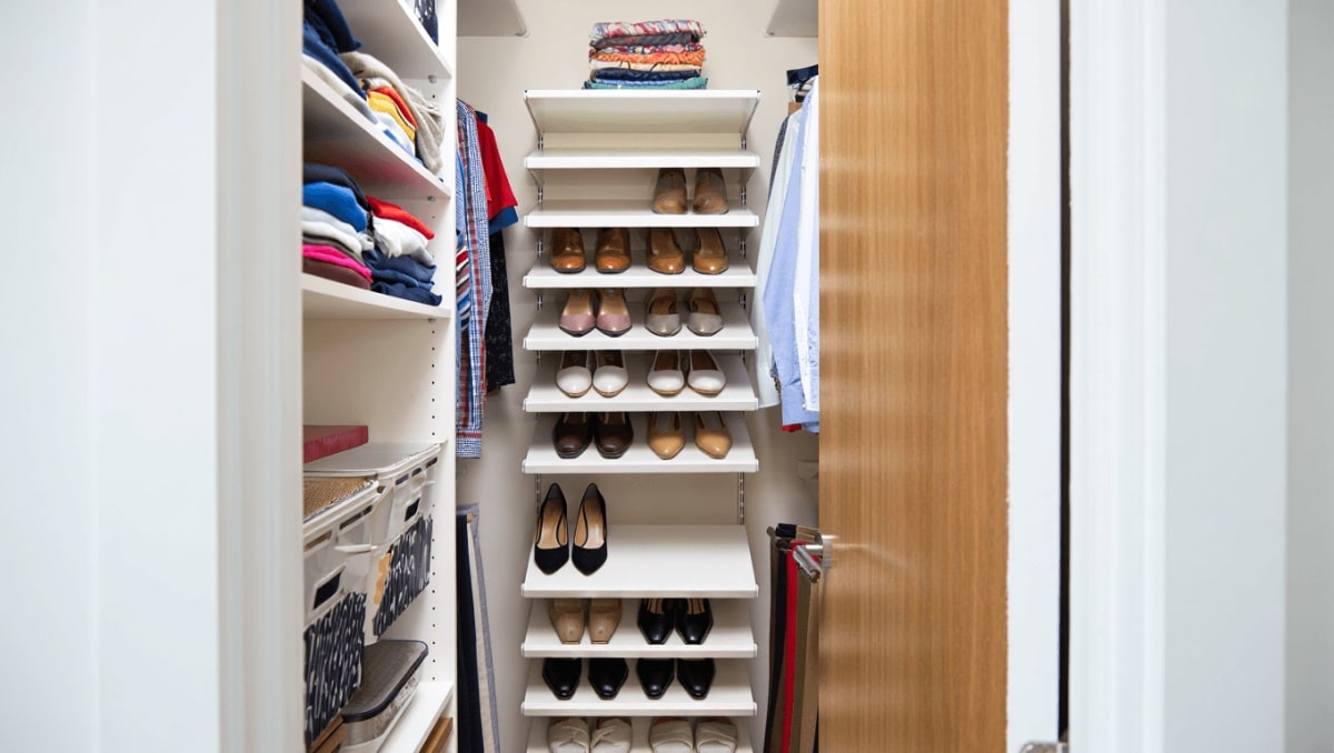 What Pro Organizers Store In Their Hall Closets To Keep Their Home Clutter-Free