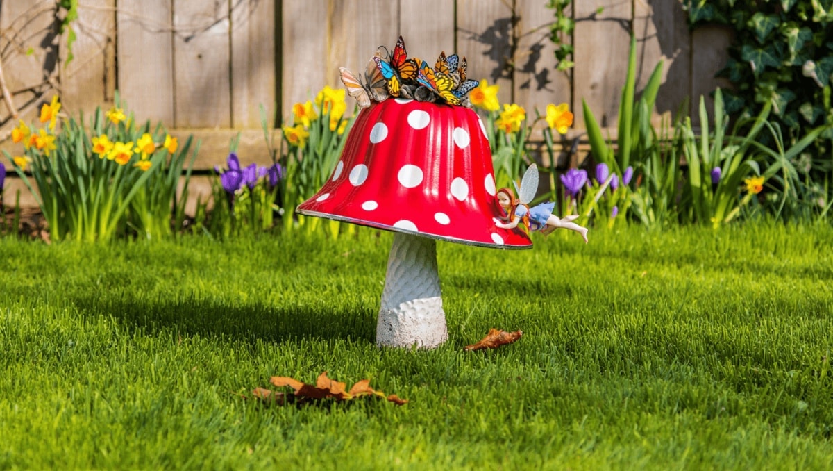 Add A Touch Of Whimsy To Your Yard With This Bundt Pan Mushroom DIY