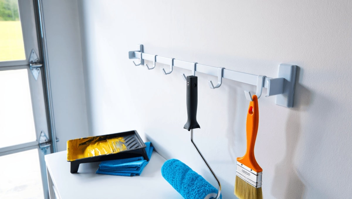 Declutter And Organize Paint Supplies Using A Simple Towel Bar Hack