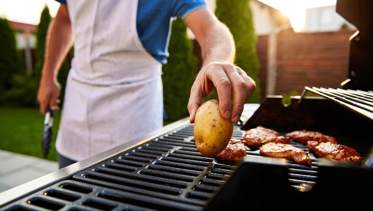 Why You Should Be Rubbing A Raw Potato On Your Grill Grates