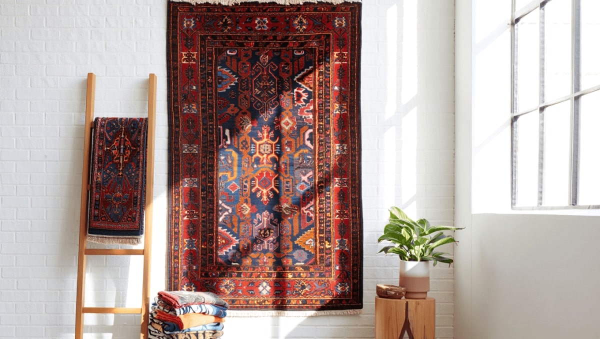 10 Stylish Ways To Decorate With Rugs That Don't Involve Floors