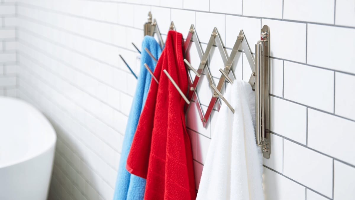 Stop Using Bulky Towel Racks: Try This Clever Space-Saving Alternative Instead