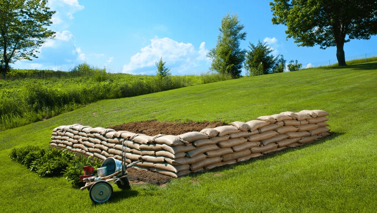Forget Pricey Concrete And Stone — There's A Cheaper Way To Build A Retaining Wall