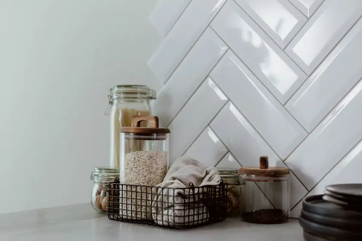Organized kitchen with sealed food containers and clean countertops