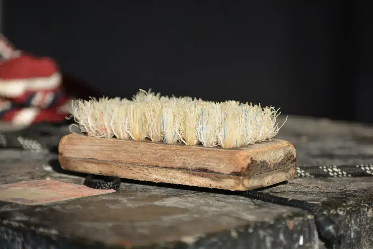 Vintage manual floor sweeper and brush from early household cleaning era