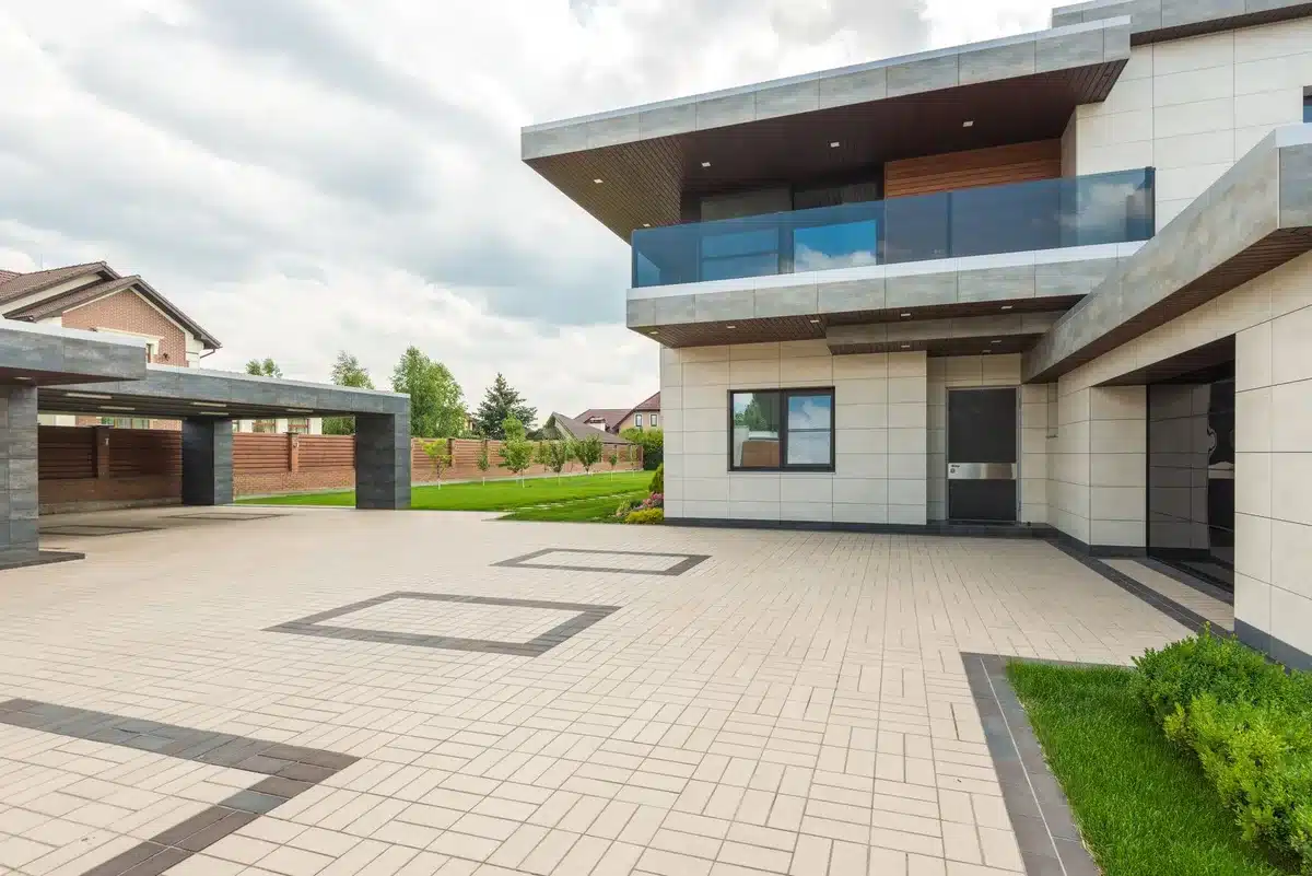 Clean, well-maintained driveway with uniform surface texture and parked car