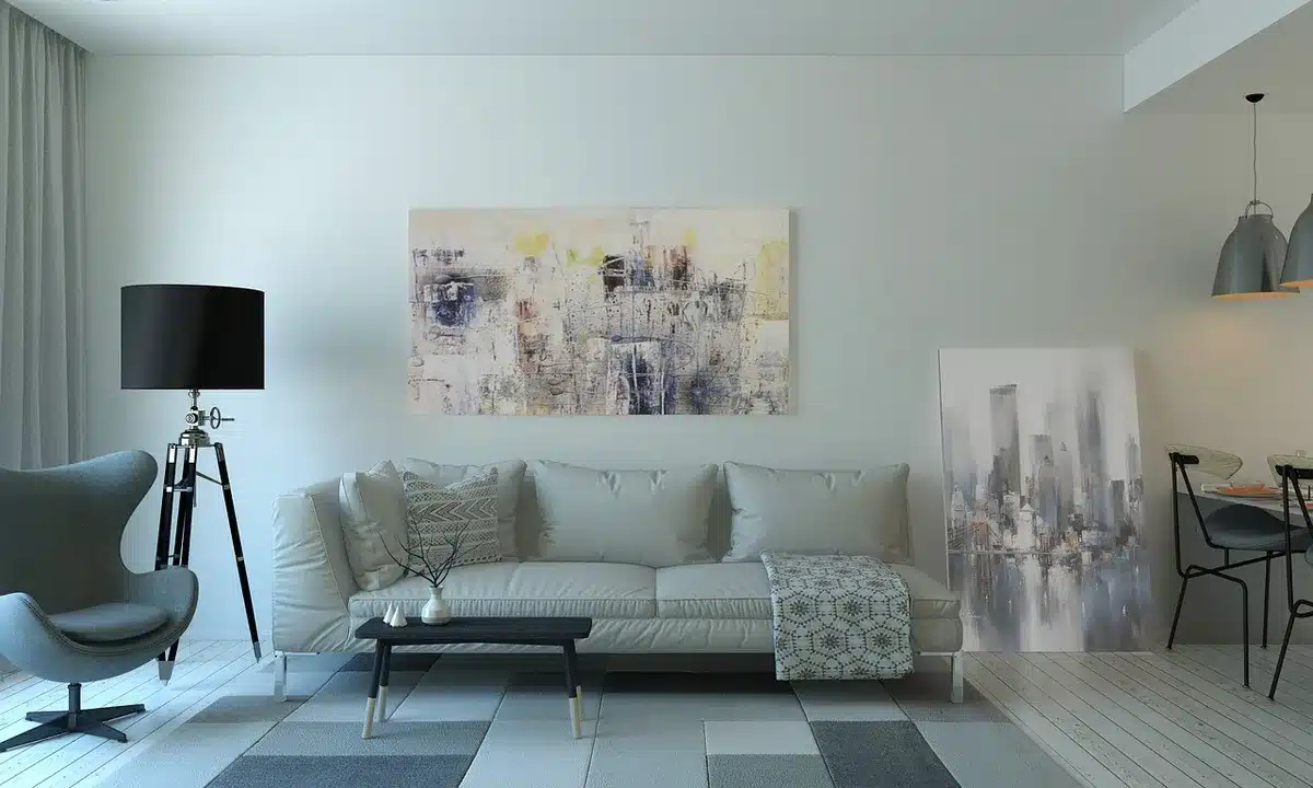 Vibrant home décor pieces including ceramic vases, geometric rugs, and textiles arranged in a bright modern living space