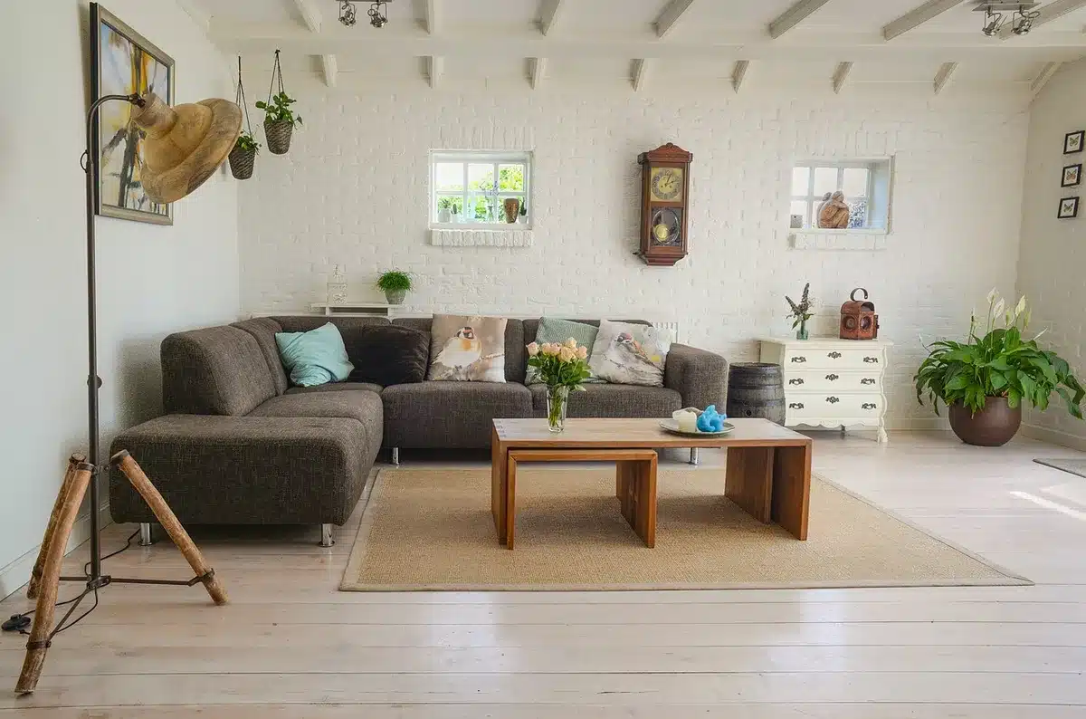 Embroidered cushion on a streamlined modern sofa