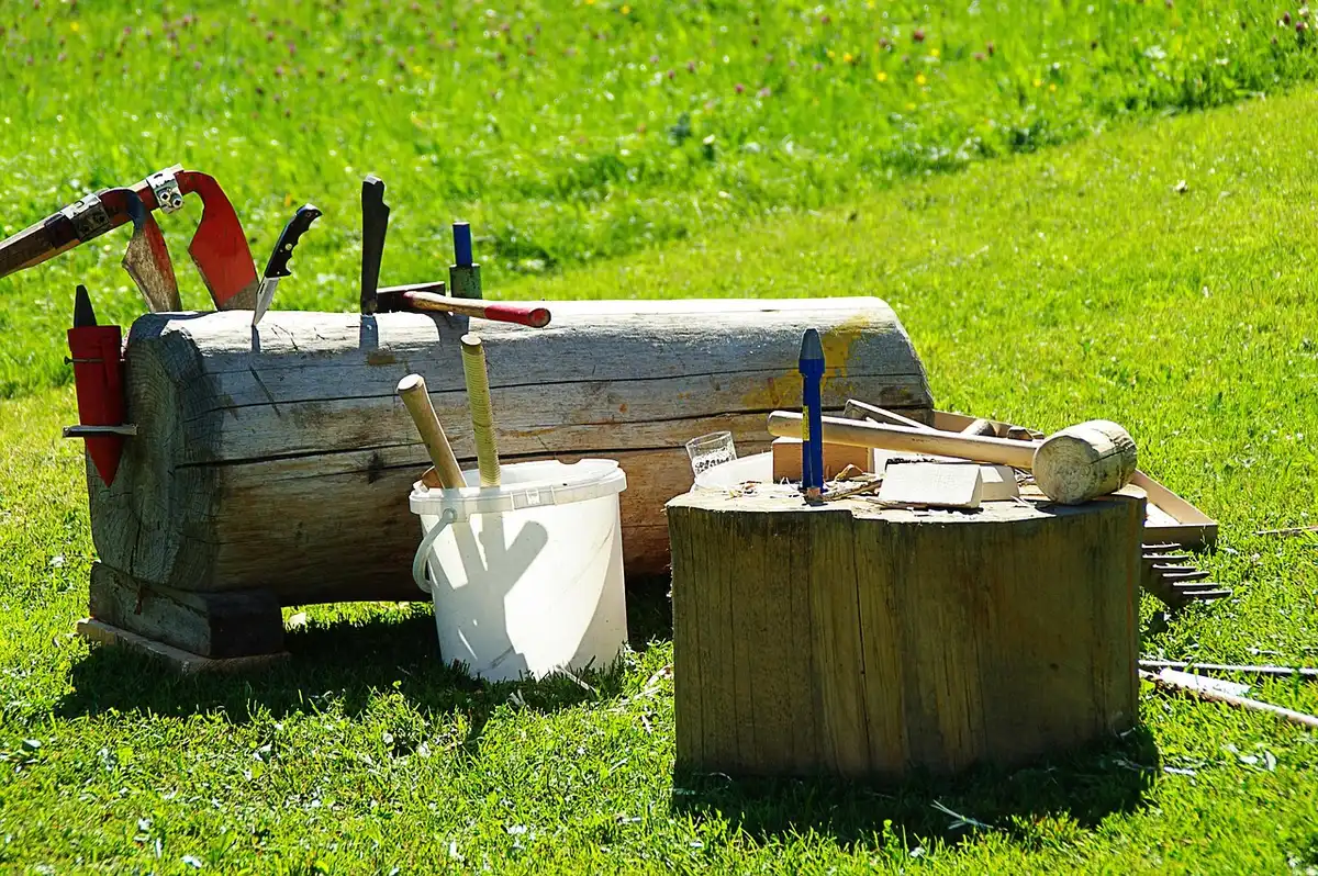 Woodworking tools and a wooden magazine rack ready for upcycling