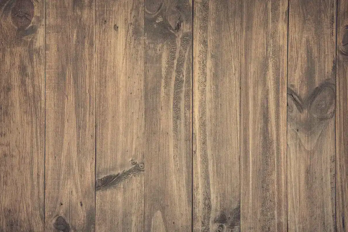 Concrete or cinder blocks next to cut wooden boards ready for shelving