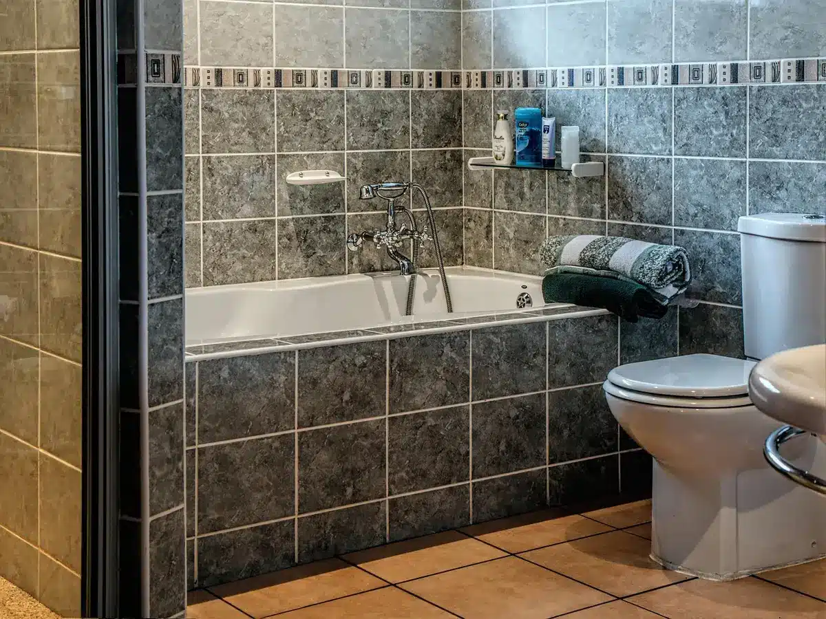 Light, lived-in bathroom with warm textures and heritage details