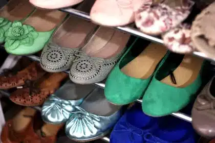Sideways shoe rack turned into a tidy gift-wrapping station in daylight
