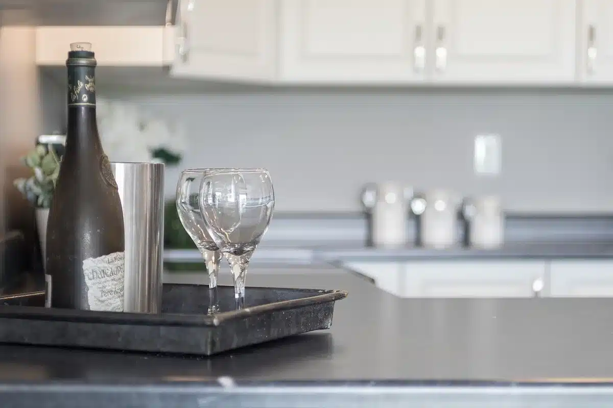 Clay-covered paper towel holder on a kitchen counter hiding most of the roll